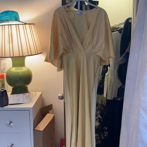 Yellow low cut gown. Perfect for black tie wedding all seasons.
